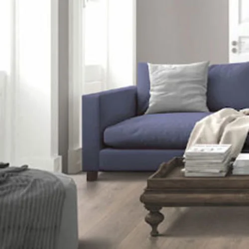 A living room with a blue sofa
